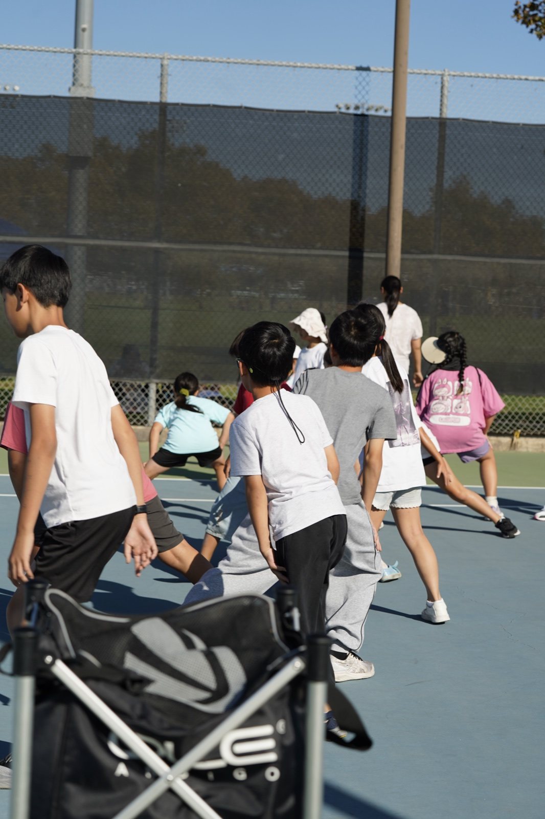 Kids at a Racket Outreach Saturday clinic, Fall 2026