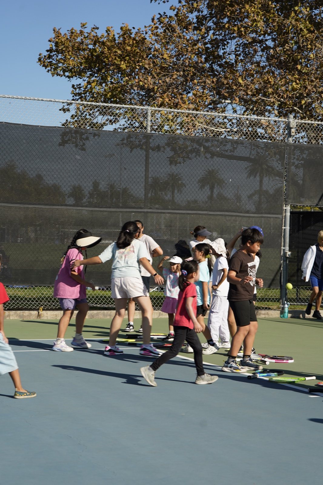 Kids at a Racket Outreach Saturday clinic, Fall 2026