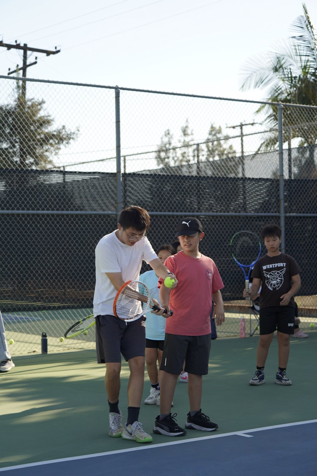 Kids at a Racket Outreach Saturday clinic, Fall 2026