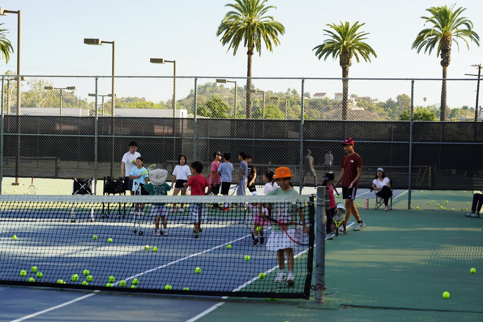 Kids at a Racket Outreach Saturday clinic, Fall 2026