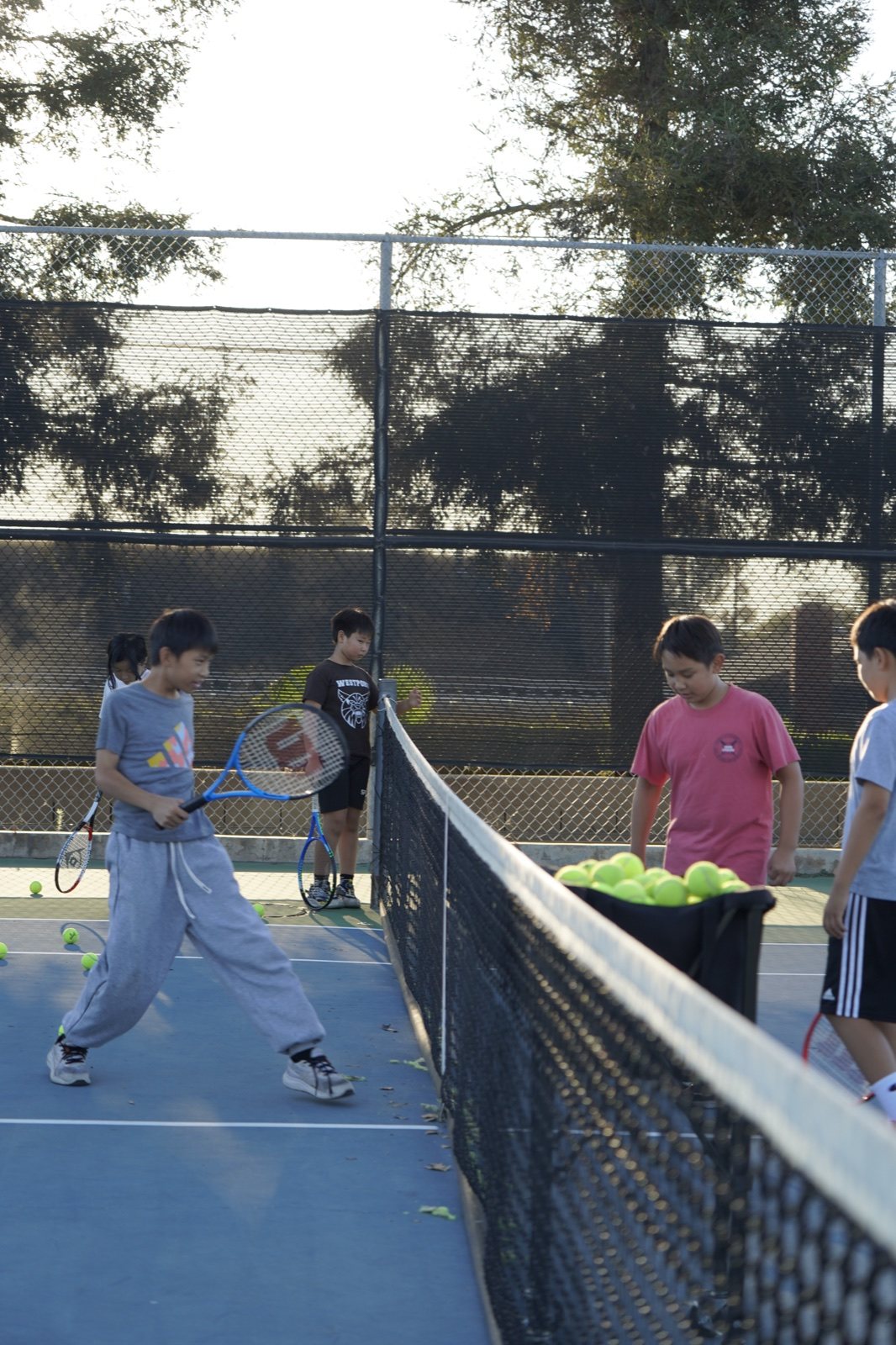 Kids at a Racket Outreach Saturday clinic, Fall 2026